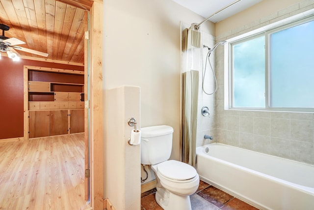 bathroom featuring a ceiling fan, toilet, tub / shower combination, and wood ceiling