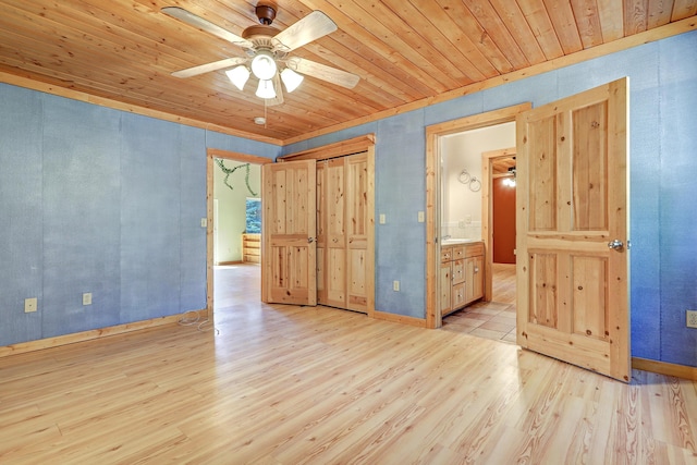 unfurnished bedroom with a ceiling fan, wood finished floors, and wooden ceiling
