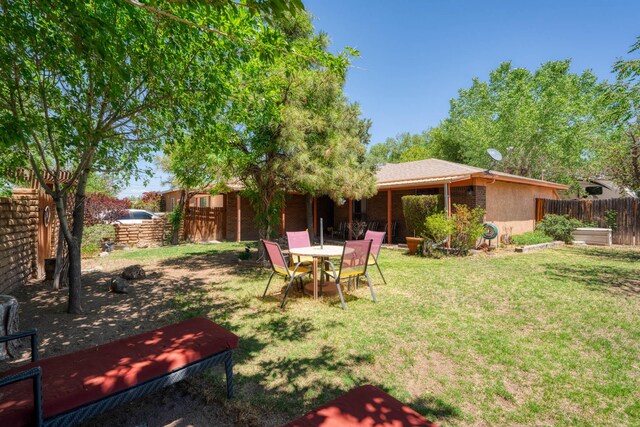 1706 Zickert Pl NW, Albuquerque, NM 87104 - view of yard with outdoor dining area