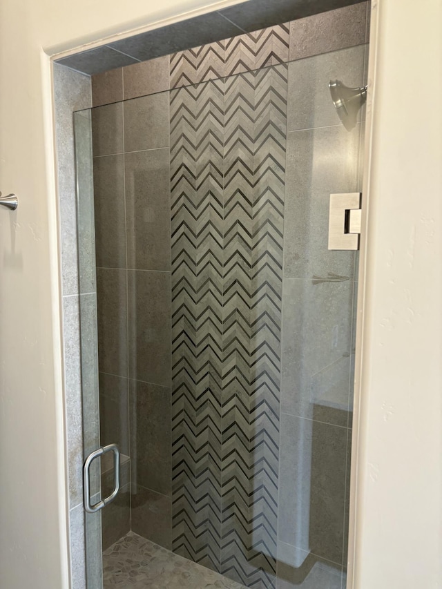 full bath featuring a stall shower