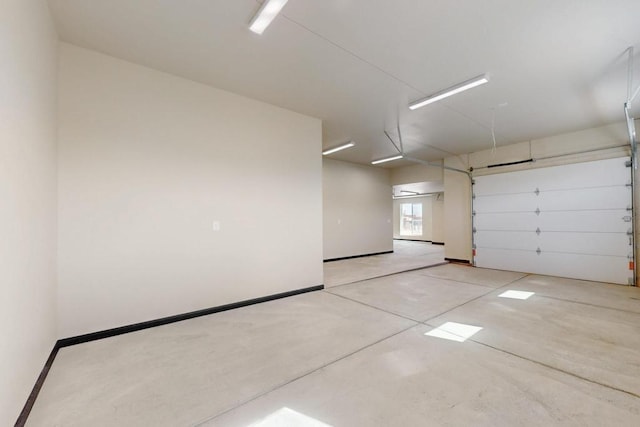 garage with baseboards