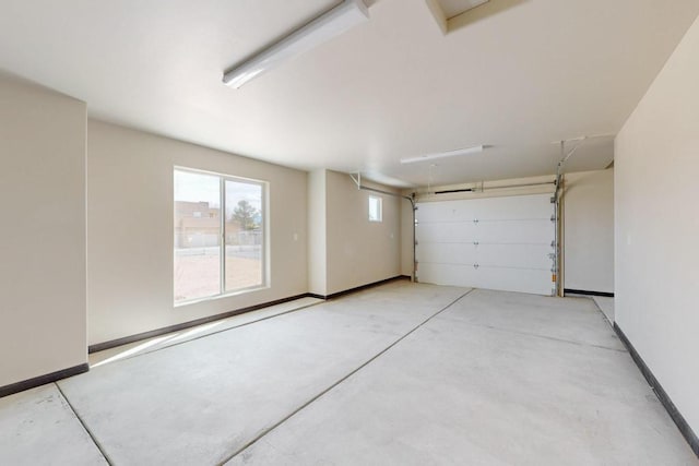 garage featuring baseboards