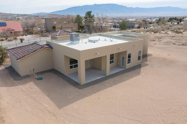 exterior space featuring a mountain view