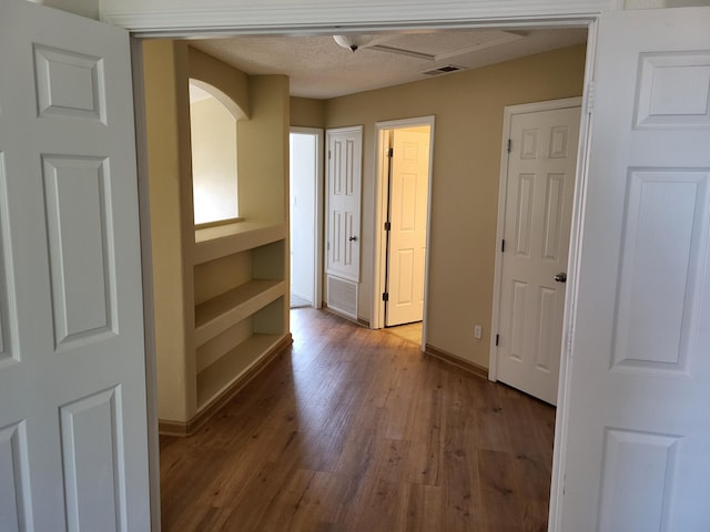 1511 White Pine Dr, Rio Rancho, NM 87144 - unfurnished bedroom with wood finished floors and baseboards