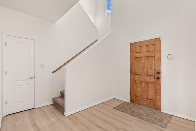 1941 Platina Rd SE, Rio Rancho, NM 87124 - foyer with baseboards, wood finished floors, and stairs
