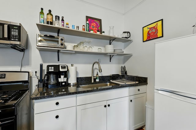 223 Edith Blvd SE, Albuquerque, NM 87102 - kitchen featuring a sink, white cabinetry, appliances with stainless steel finishes, and open shelves