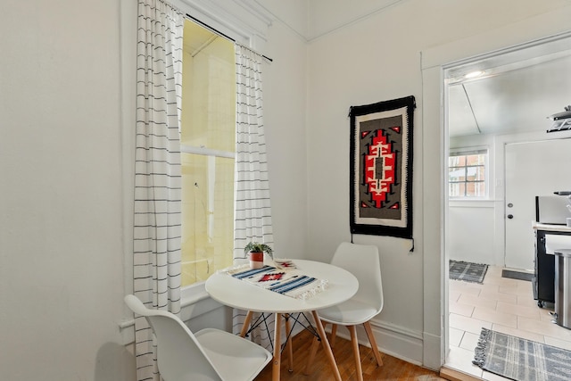 223 Edith Blvd SE, Albuquerque, NM 87102 - dining room with baseboards and wood finished floors