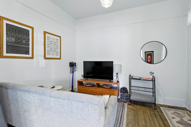 223 Edith Blvd SE, Albuquerque, NM 87102 - living area featuring baseboards and wood finished floors