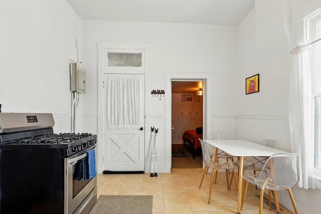 223 Edith Blvd SE, Albuquerque, NM 87102 - kitchen featuring stainless steel range with gas stovetop and light tile patterned floors