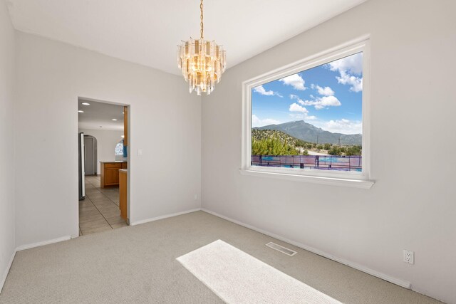 115 Camino De Las Huertas, Placitas, NM 87043 - unfurnished room with carpet flooring, a ceiling fan, and recessed lighting