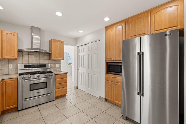 115 Camino De Las Huertas, Placitas, NM 87043 - dining room featuring a chandelier, arched walkways, light tile patterned flooring, and healthy amount of natural light