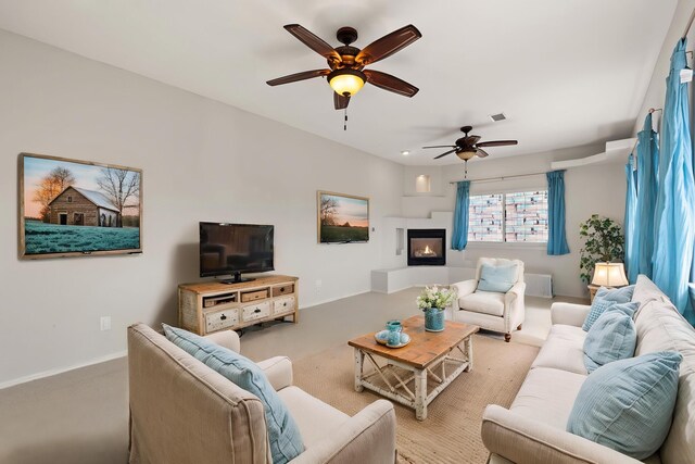 115 Camino De Las Huertas, Placitas, NM 87043 - unfurnished living room featuring arched walkways, carpet flooring, a large fireplace, and a mountain view