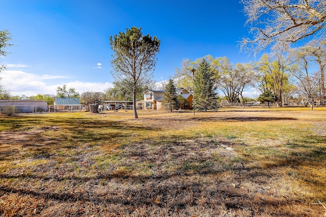 view of yard featuring fence