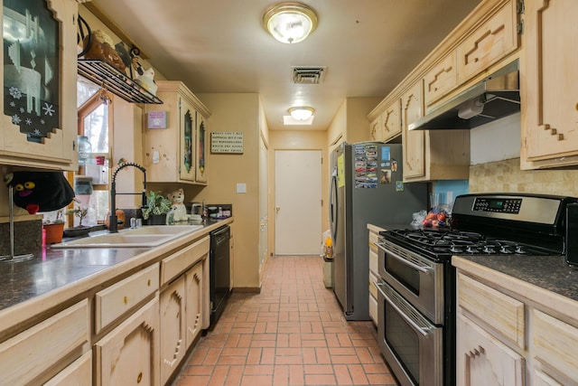 32 Puntilla Dr Unit B, Tijeras, NM 87059 - kitchen with double oven range, a sink, visible vents, under cabinet range hood, and brick floor