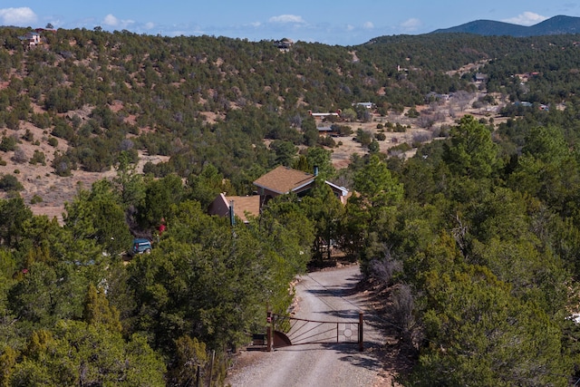 32 Puntilla Dr Unit B, Tijeras, NM 87059 - bird's eye view with a wooded view and a mountain view