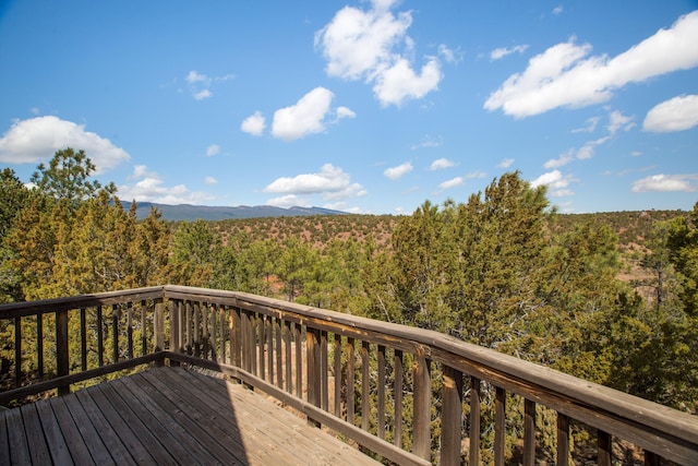 32 Puntilla Dr Unit B, Tijeras, NM 87059 - wooden terrace featuring a wooded view