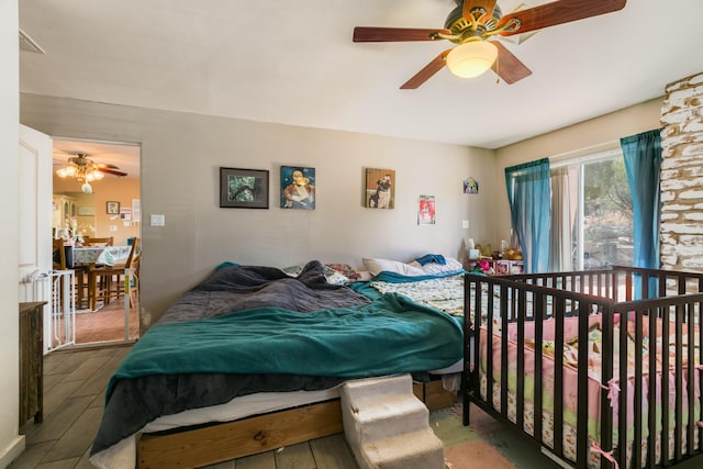 32 Puntilla Dr Unit B, Tijeras, NM 87059 - bedroom with visible vents, wood finished floors, and a ceiling fan
