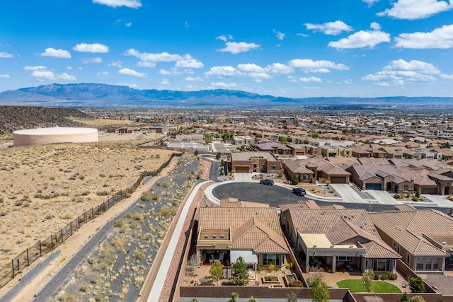 bird's eye view with a mountain view and a residential view