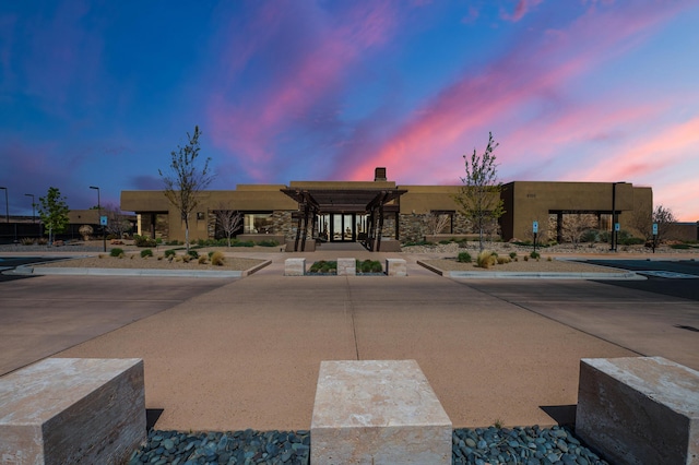 view of property at dusk