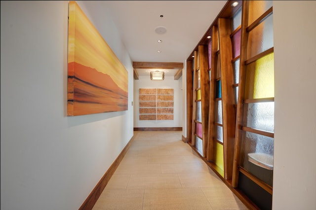 corridor featuring baseboards