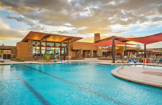 pool with a patio area