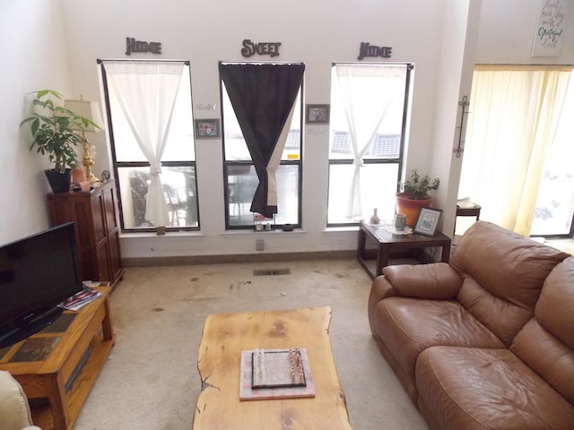 12900 Piru Blvd SE, Albuquerque, NM 87123 - living room featuring carpet