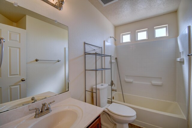 6259 Azaleas Rd NW, Albuquerque, NM 87114 - full bath with vanity, shower / bath combination, and a textured ceiling