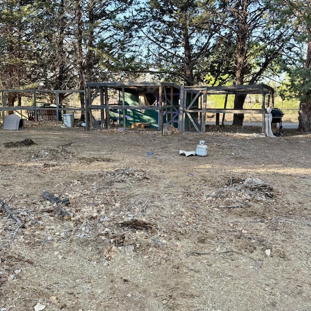 78 Quirks Ln, Corrales, NM 87048 - view of yard featuring an outbuilding and exterior structure