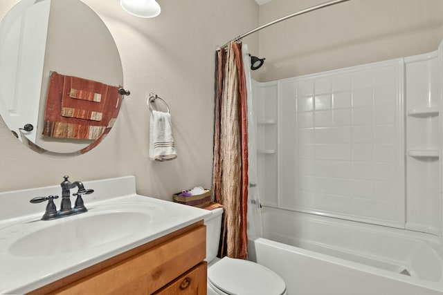 bathroom with toilet, a textured wall, shower / bath combination with curtain, and vanity
