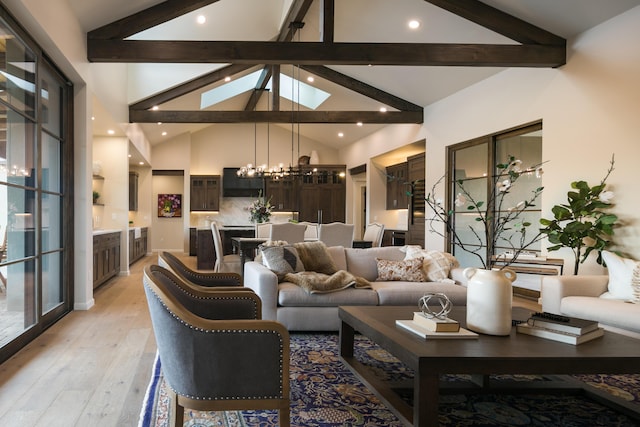 1016 Guadalupe Villa NW, Albuquerque, NM 87114 - living room with light wood-type flooring, an inviting chandelier, recessed lighting, beam ceiling, and high vaulted ceiling