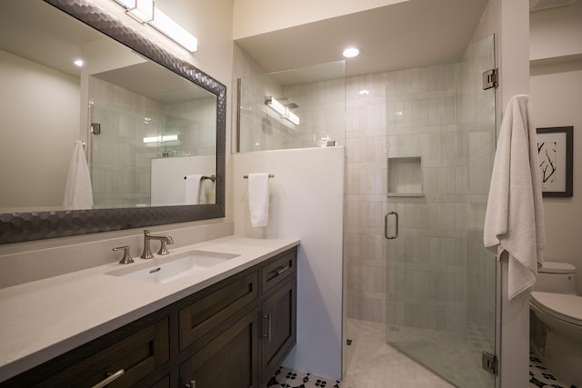 1016 Guadalupe Villa NW, Albuquerque, NM 87114 - full bath featuring toilet, vanity, and a shower stall