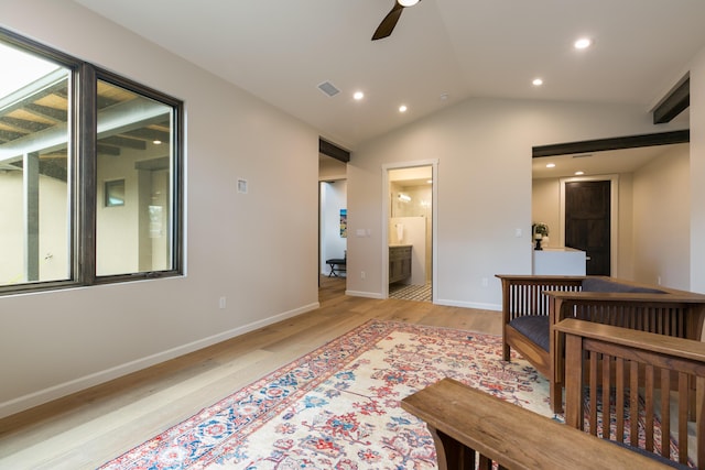 1016 Guadalupe Villa NW, Albuquerque, NM 87114 - interior space with baseboards, vaulted ceiling, connected bathroom, light wood-style floors, and visible vents