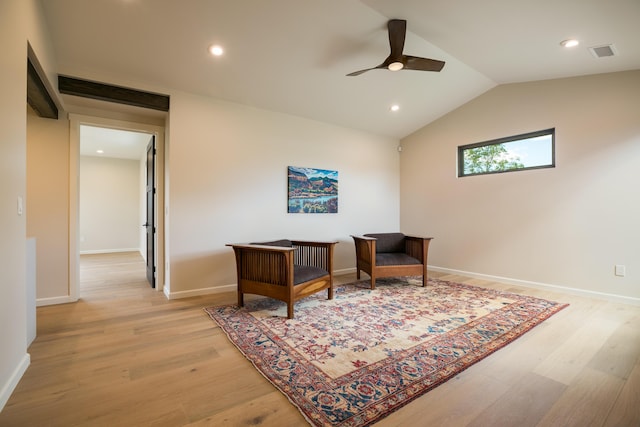 1016 Guadalupe Villa NW, Albuquerque, NM 87114 - living area with lofted ceiling, visible vents, light wood-type flooring, and ceiling fan