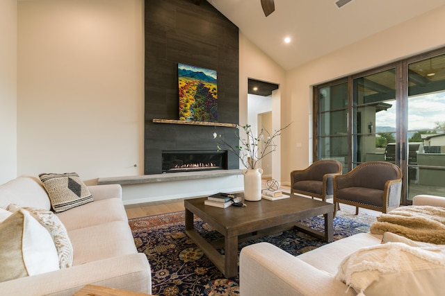 1016 Guadalupe Villa NW, Albuquerque, NM 87114 - living room with a fireplace, recessed lighting, visible vents, high vaulted ceiling, and wood finished floors