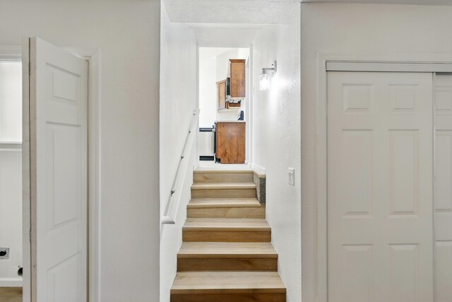 16 Apache Plume Rd, Los Lunas, NM 87031 - stairs featuring baseboards