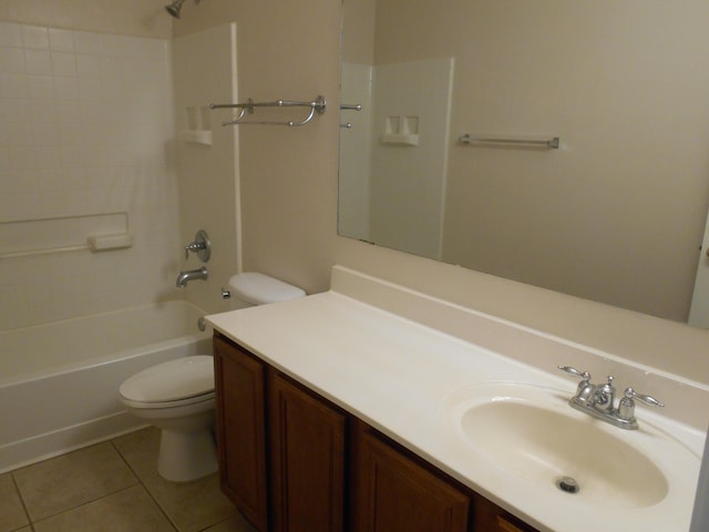 3461 Lone Tree St SW, Los Lunas, NM 87031 - bathroom with toilet, tile patterned floors, vanity, and washtub / shower combination
