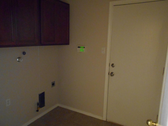 3461 Lone Tree St SW, Los Lunas, NM 87031 - clothes washing area with hookup for a gas dryer, hookup for an electric dryer, baseboards, and cabinet space