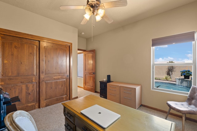3605 Greystone Ridge Dr SE, Rio Rancho, NM 87124 - office area with light colored carpet, ceiling fan, and baseboards