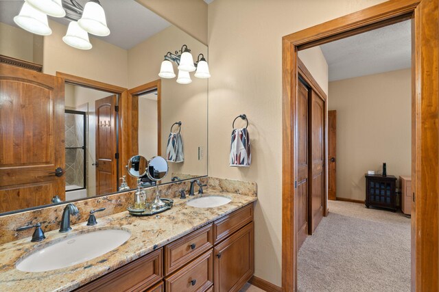 3605 Greystone Ridge Dr SE, Rio Rancho, NM 87124 - full bath featuring double vanity and baseboards