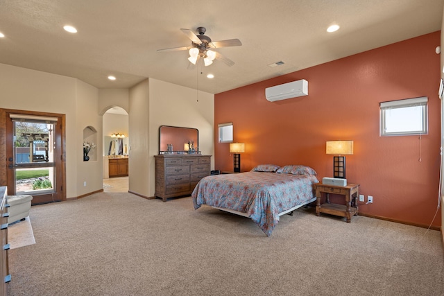 3605 Greystone Ridge Dr SE, Rio Rancho, NM 87124 - bedroom featuring an AC wall unit, carpet floors, arched walkways, baseboards, and recessed lighting