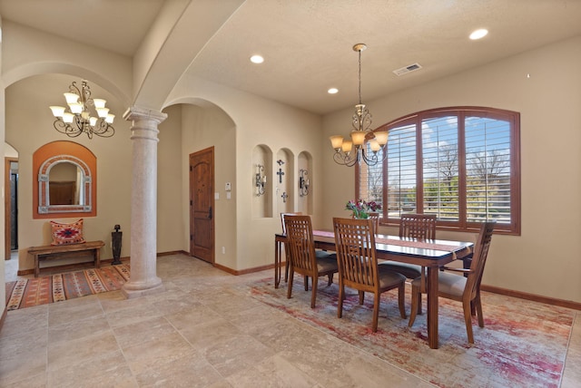 3605 Greystone Ridge Dr SE, Rio Rancho, NM 87124 - dining area featuring a chandelier, recessed lighting, baseboards, and arched walkways