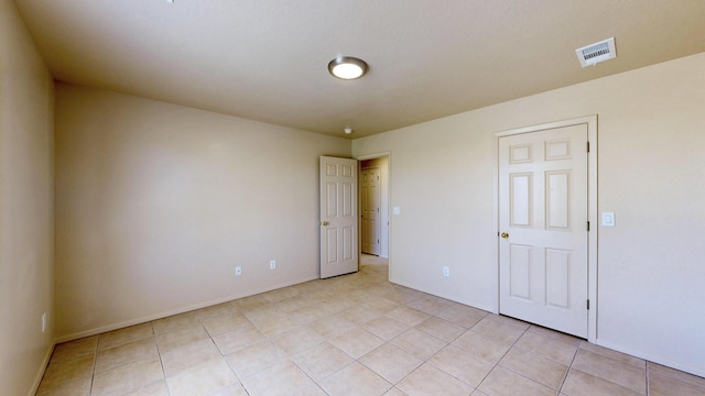 504 Maple Ave, Moriarty, NM 87035 - unfurnished room featuring light tile patterned flooring and baseboards