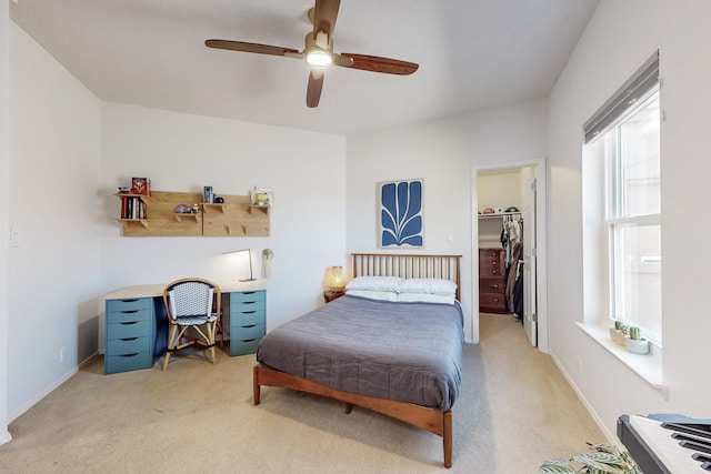 122 Martha Ct, Corrales, NM 87048 - bedroom featuring light carpet, a closet, a ceiling fan, and a walk in closet