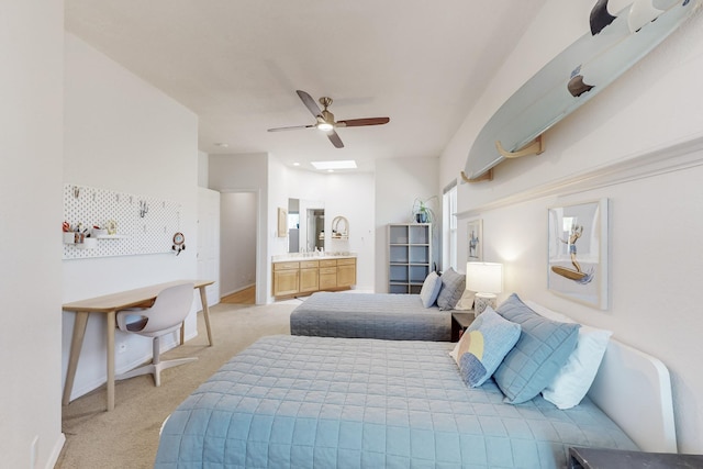 122 Martha Ct, Corrales, NM 87048 - bedroom with light carpet, ceiling fan, ensuite bath, and baseboards