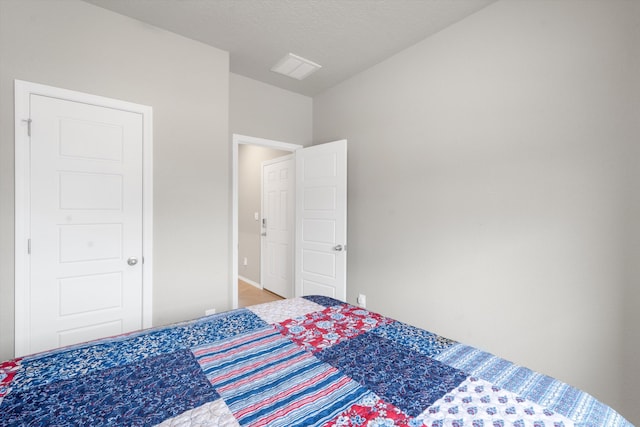 bedroom with visible vents