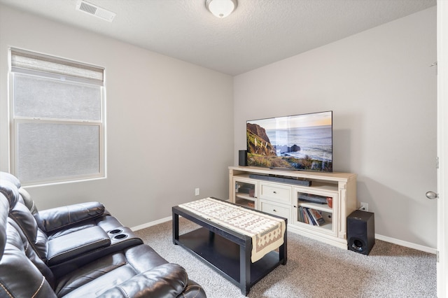 carpeted living room featuring baseboards and visible vents