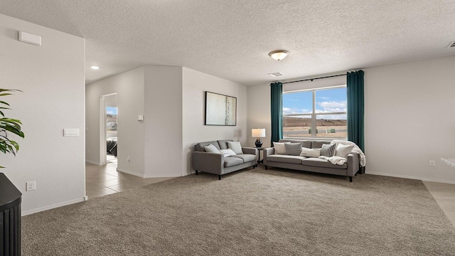 living room with recessed lighting, baseboards, light colored carpet, and a textured ceiling