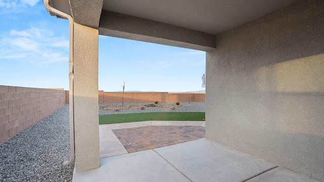 view of patio with a fenced backyard