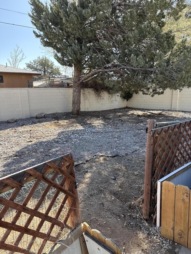 view of yard featuring a fenced backyard