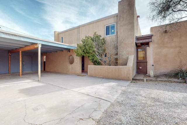 1005 Guadalupe Del Prado St NW, Albuquerque, NM 87107 - view of front of home featuring stucco siding